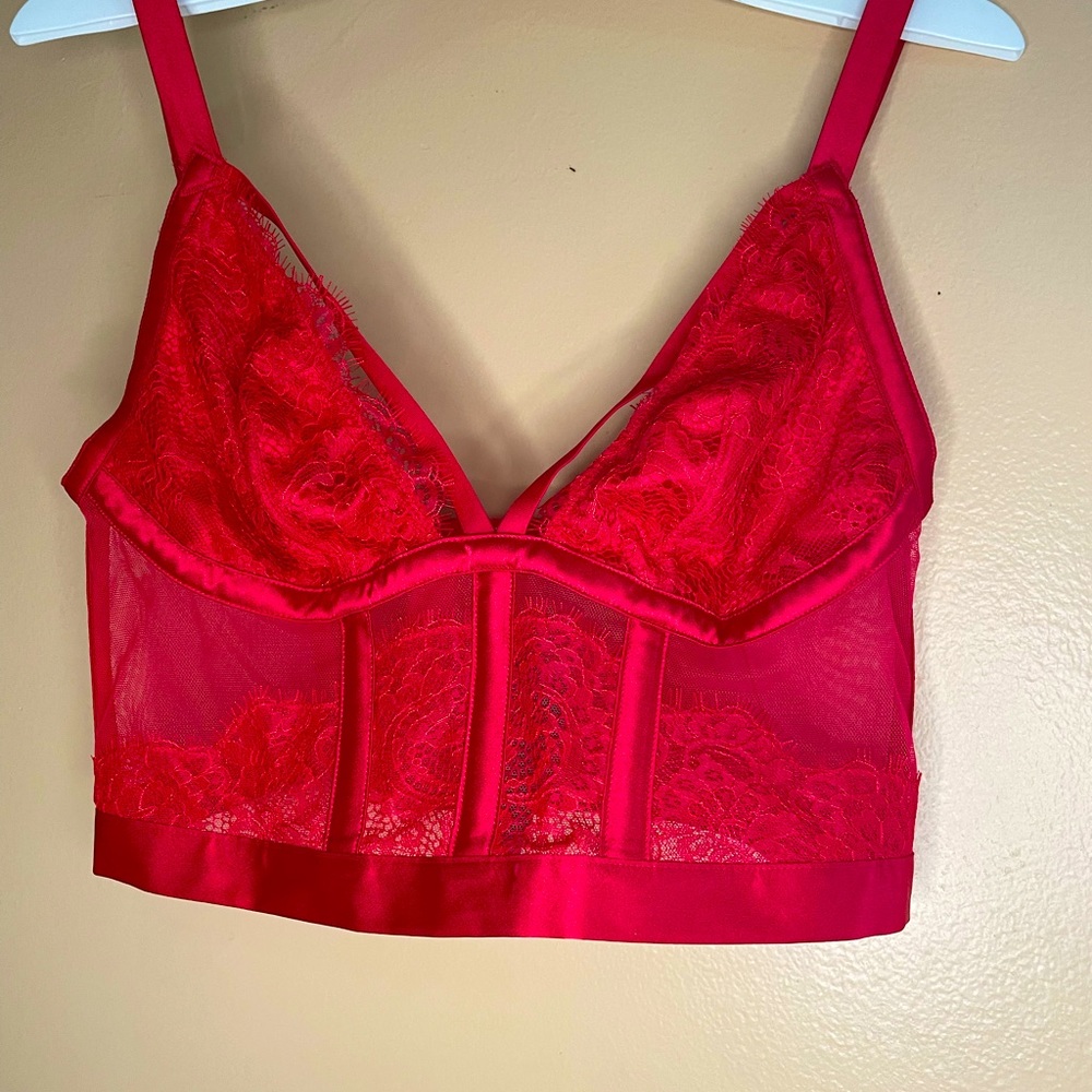 Red corset, with clips on back great condition.